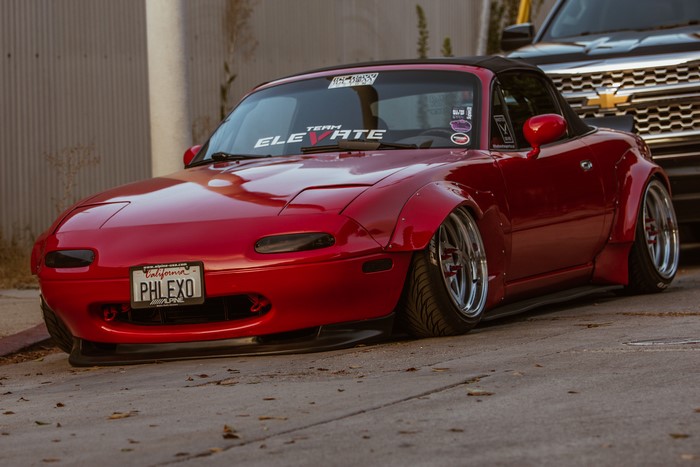 Red Mazda MX-5 Widebody with Pop-Up Headlights
