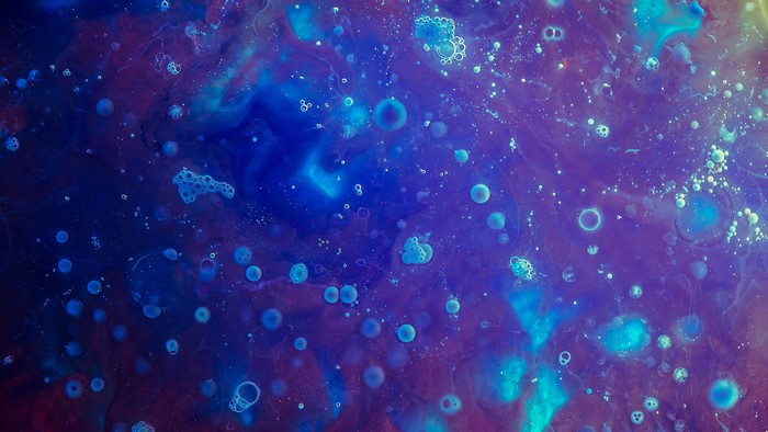 Abstract photography of blue and purple liquid with bubbles