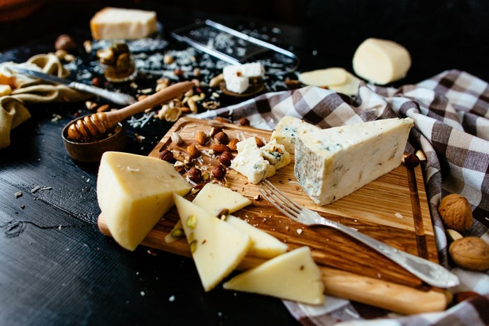 Cheese board with nuts and honey