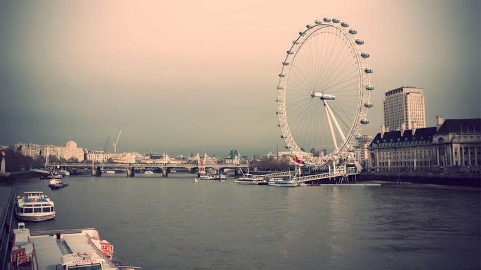 London Eye and River Thames cityscape with boats
