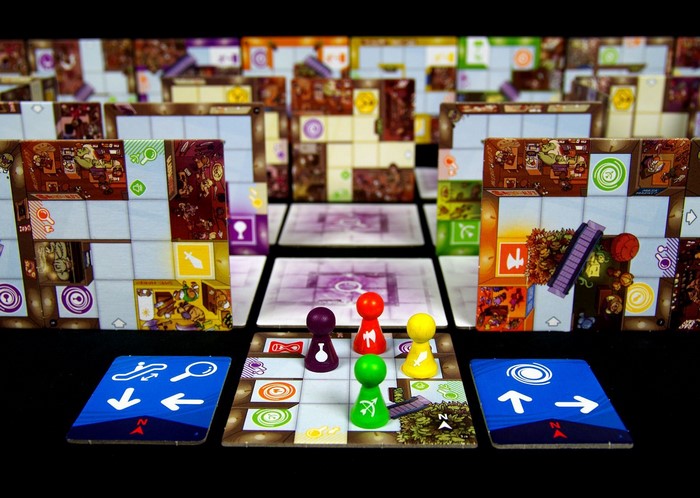 Magic Maze board game with pawns and cards