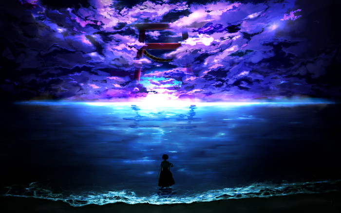Torii gate in purple clouds over the sea