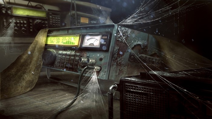 Old radio equipment covered in cobwebs