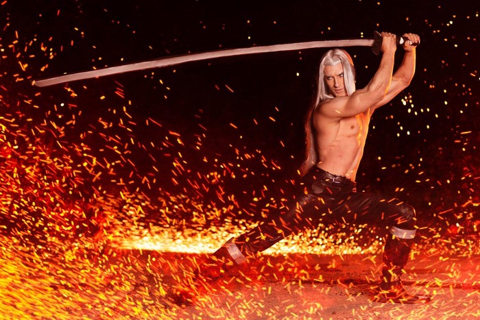 Sephiroth from Final Fantasy 7: Advent Children with sword and sparks