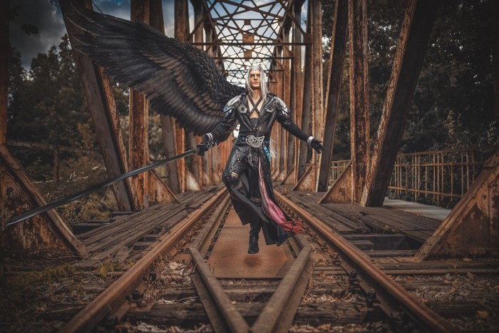 Sephiroth from Final Fantasy with wings and sword on a bridge
