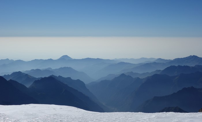 Mountains with mist and clear sky