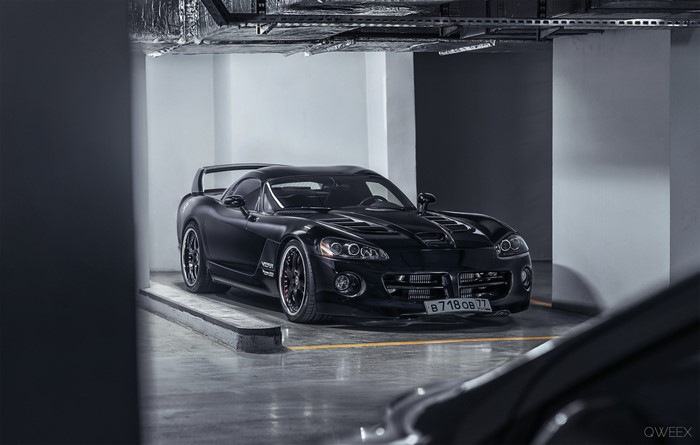 Black Dodge Viper SRT-10 parked in a garage
