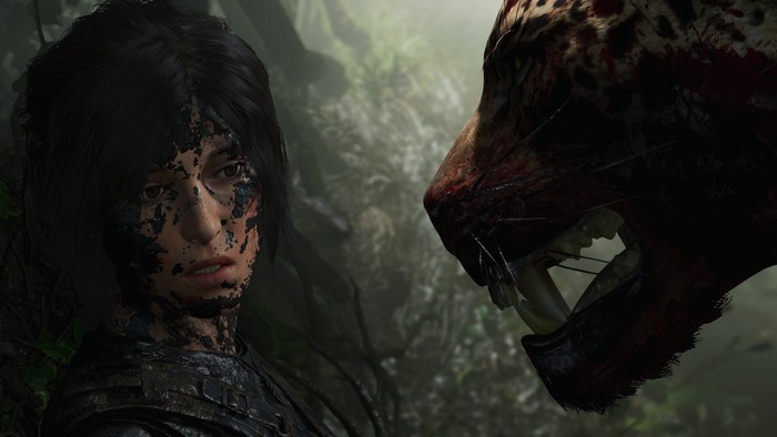 Lara Croft from Shadow of the Tomb Raider facing a jaguar