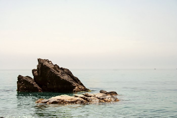 Rocks in the sea with horizon