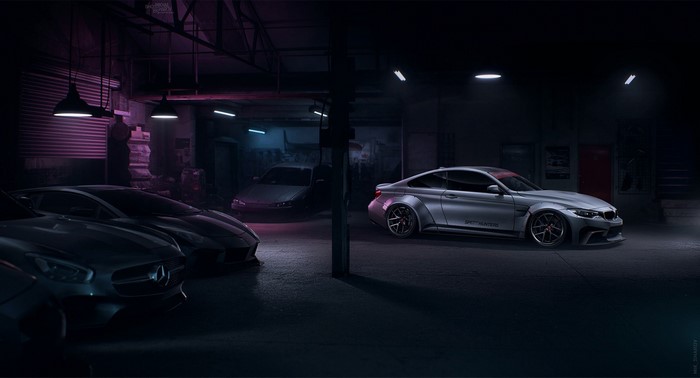 Cars in a dark garage with neon lights