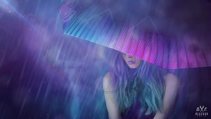 Woman with umbrella in the rain