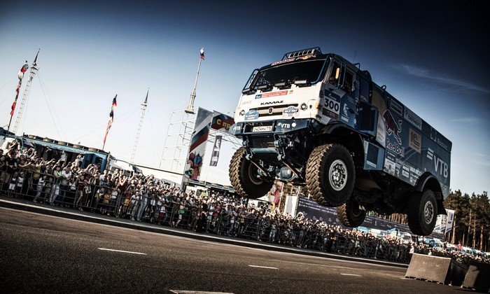 Kamaz truck jumping over a crowd at a race