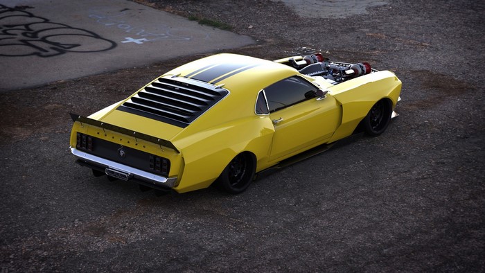 Yellow Ford Mustang with twin turbos