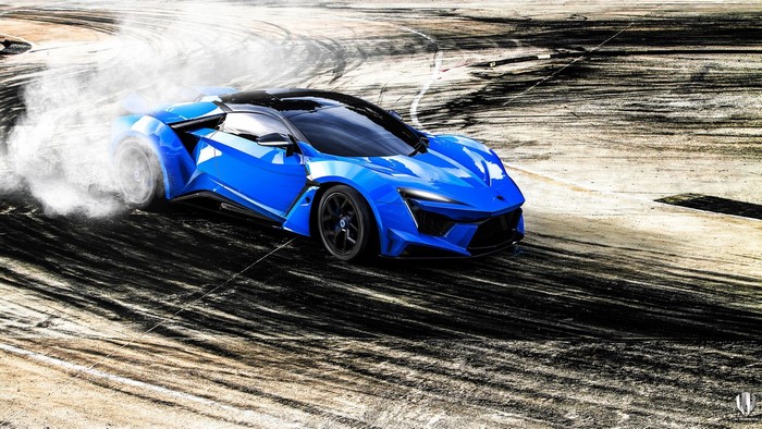 Blue Fenyr Supersport car drifting with smoke