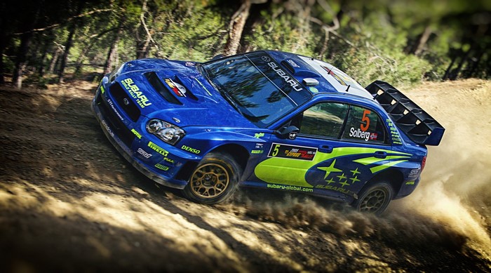 Petter Solberg's Subaru Impreza rally car on a dirt track
