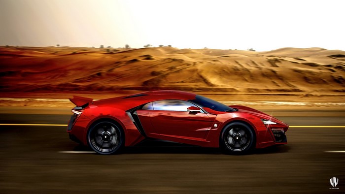 Red Lykan Hypersport car driving on a desert road