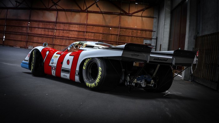 Porsche 917 race car in a garage