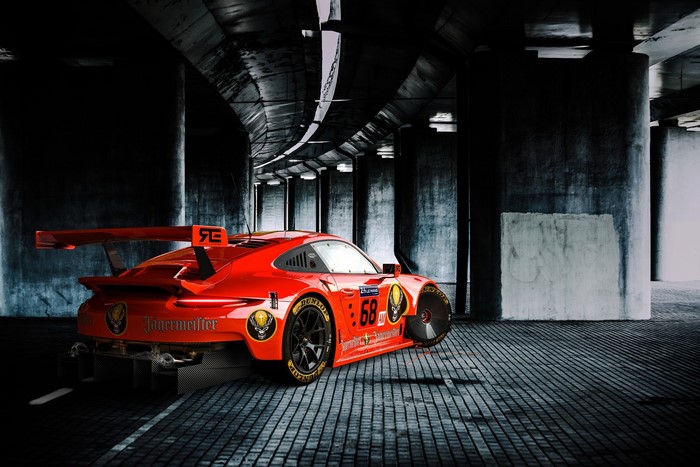 Red Porsche 911 RSR race car with Jägermeister livery