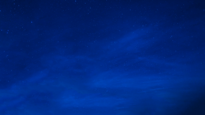 Night sky with stars and clouds