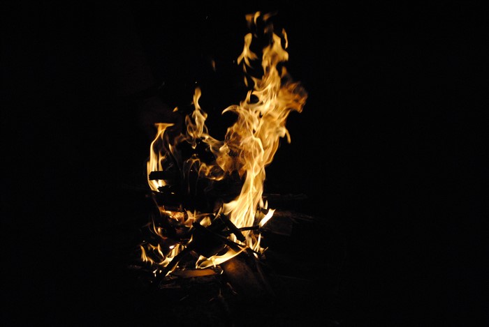 Burning wood at night