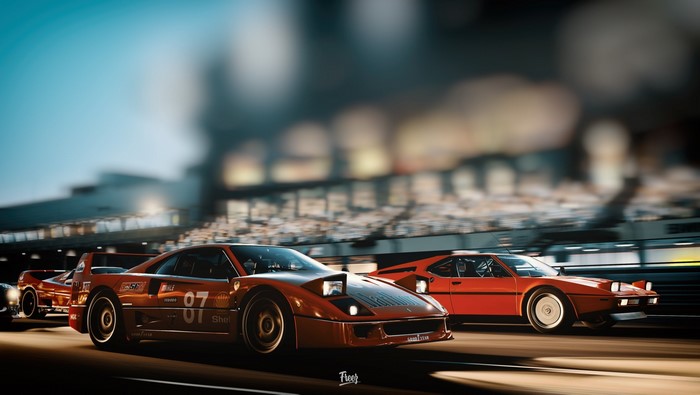 Ferrari F40 and BMW M1 race cars on track
