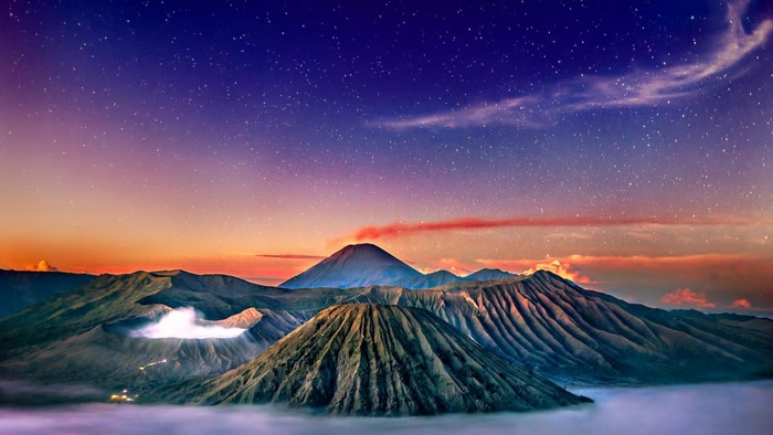 Mount Bromo volcano landscape under starry sky