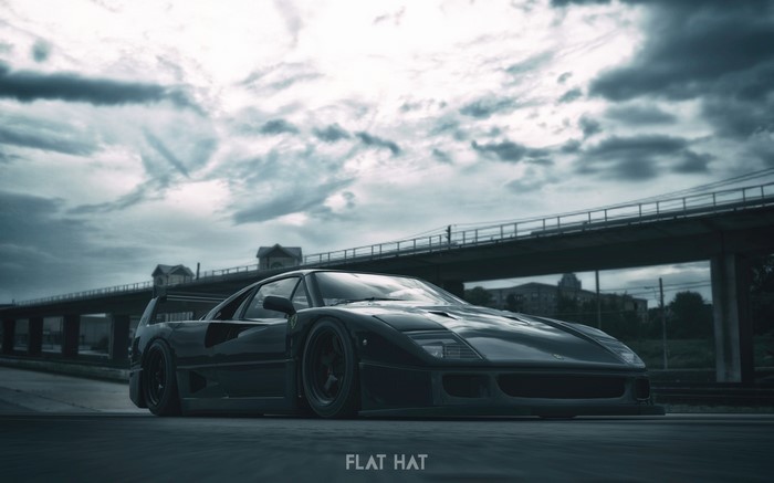 Black Ferrari F40 on a cloudy day
