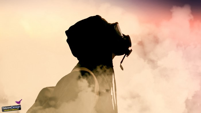 Person wearing a gas mask in smoke