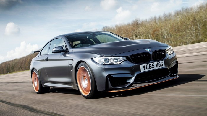 BMW M4 Coupe with Copper Wheels on Road