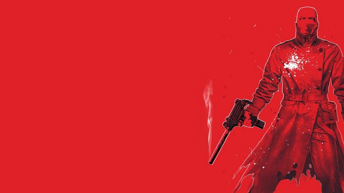 Red Hood from DC Comics with a gun