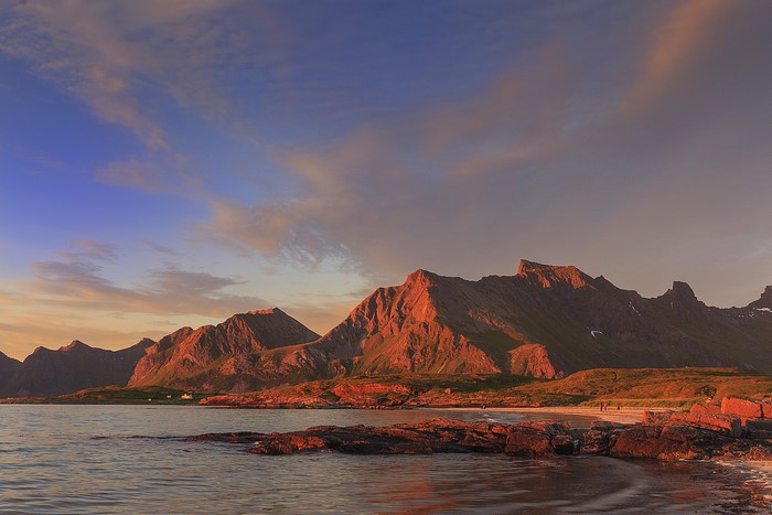 Sunset over mountains and coast in Lofoten Islands, Norway