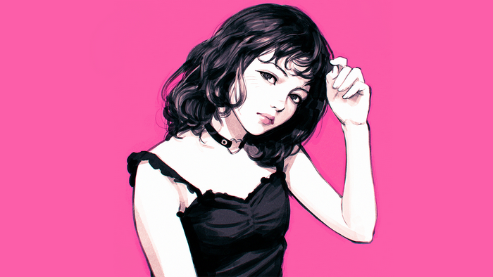 Woman with dark curly hair and black dress