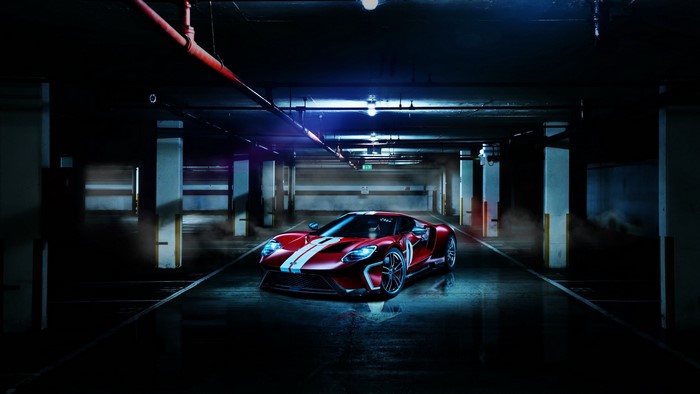 Red Ford GT Mk II in a dark parking garage