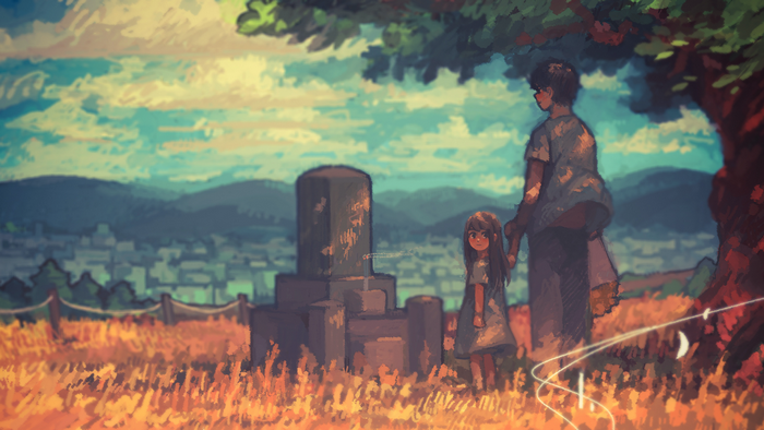 A person and a child stand by a monument in a field