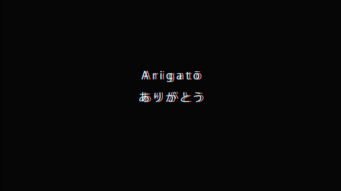 Arigato text in English and Japanese