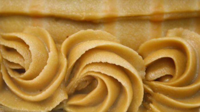 Close-up of caramel frosting on a cake