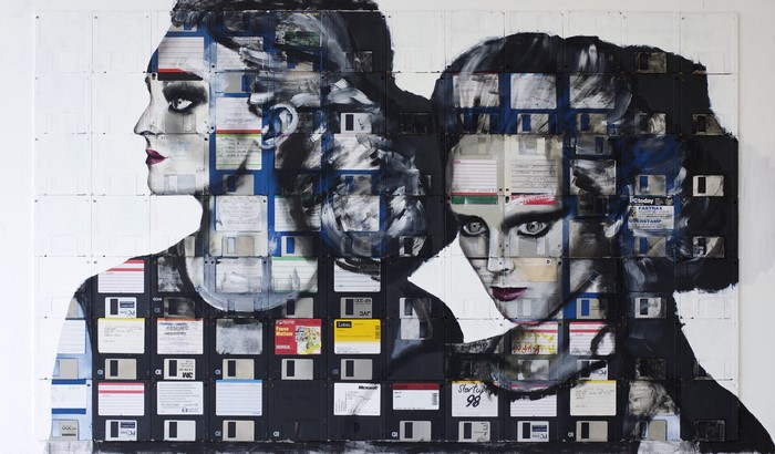Artwork of two women faces made from floppy disks by Nick Gentry