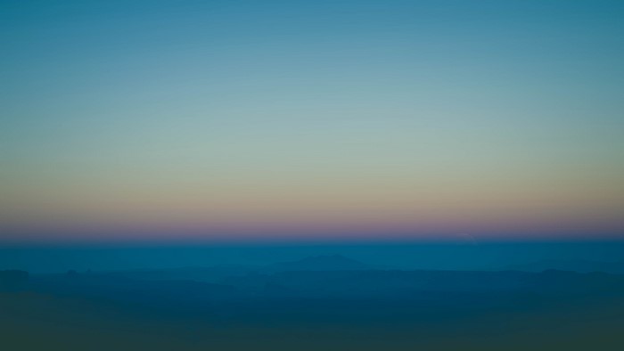 4K minimalist mountain horizon at sunrise