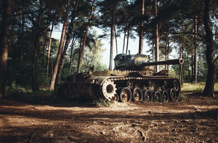 Abandoned tank in a forest