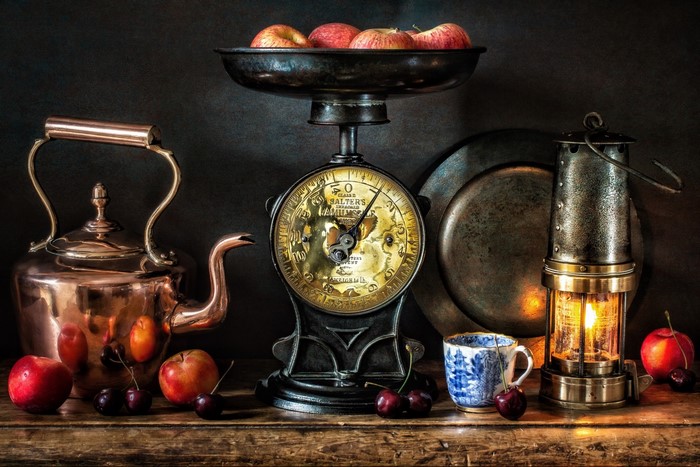 Still life with apples, cherries, and a vintage scale