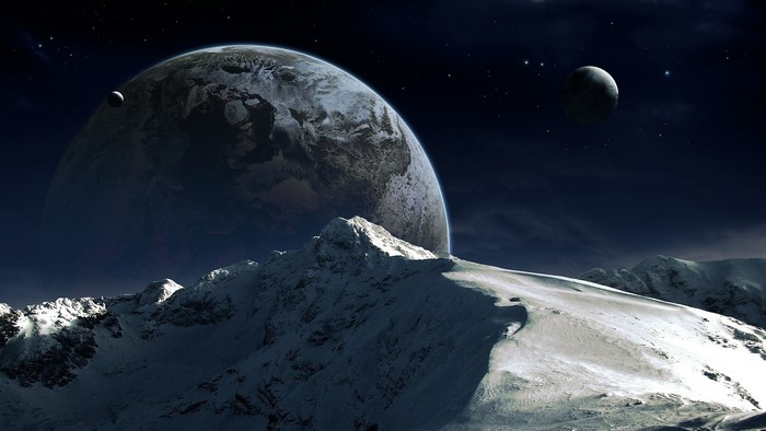 Planet and moons over snowy mountains in space