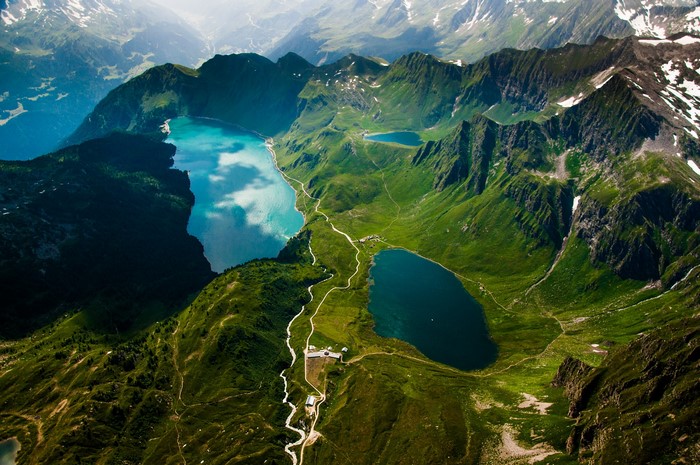 Aerial view of lakes and mountains in the Alps