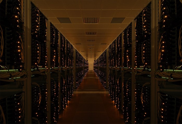 Server racks in a data center with glowing lights
