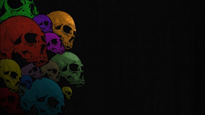 Colorful skulls on a black background
