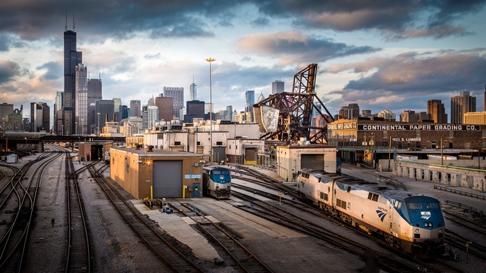 4K Chicago cityscape with Amtrak trains in rail yard