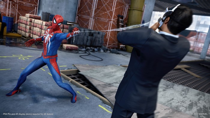 Spider-Man from Spider-Man (2018) fighting a man