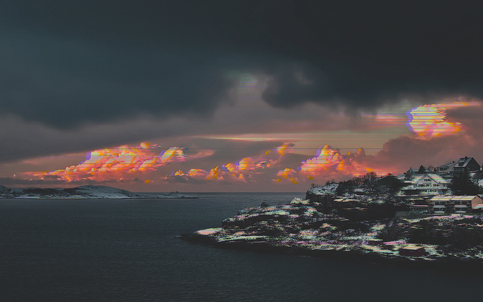 Glitchy winter coastal landscape with houses