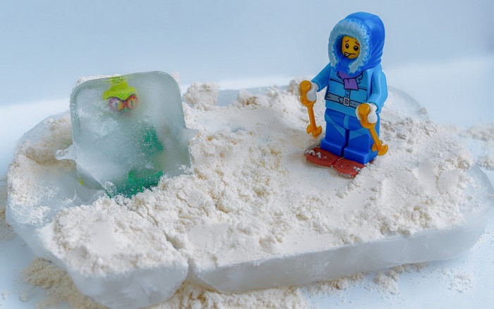 LEGO minifigure in snow with frozen figure