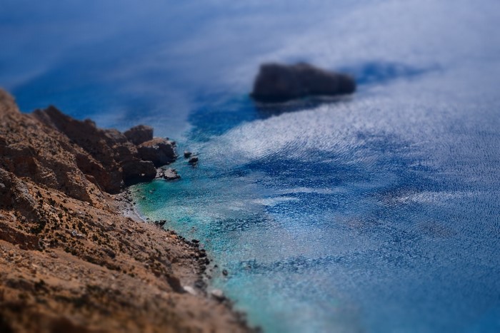 4K Greece Coastline with Rocky Cliffs and Blue Water