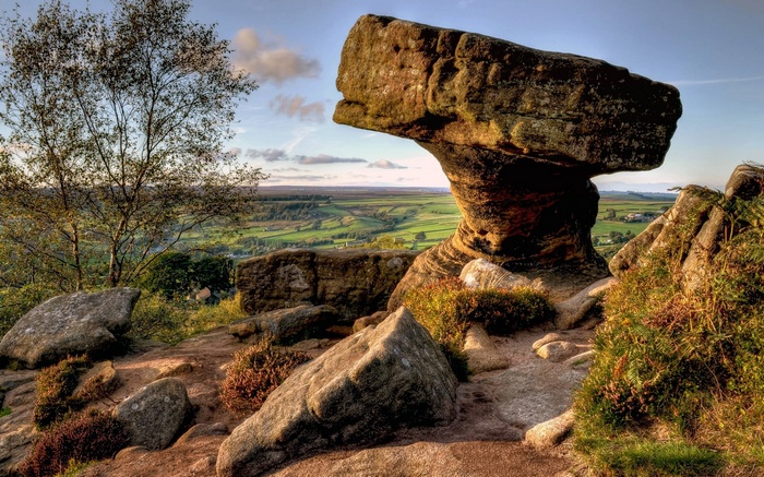 Rock formations on a hill overlooking a valley